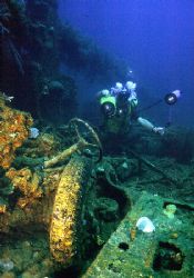 'SEIKO' Diver working one of the trucks on the Seiko Maru... by Rick Tegeler 